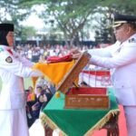 Wakil Bupati Asahan Pimpin Upacara Penurunan Bendera HUT ke-80 RI